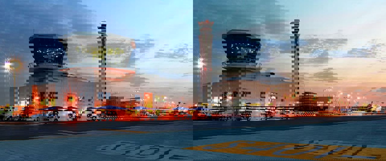 Early morning photograph of the Control Tower at DWC from the airside